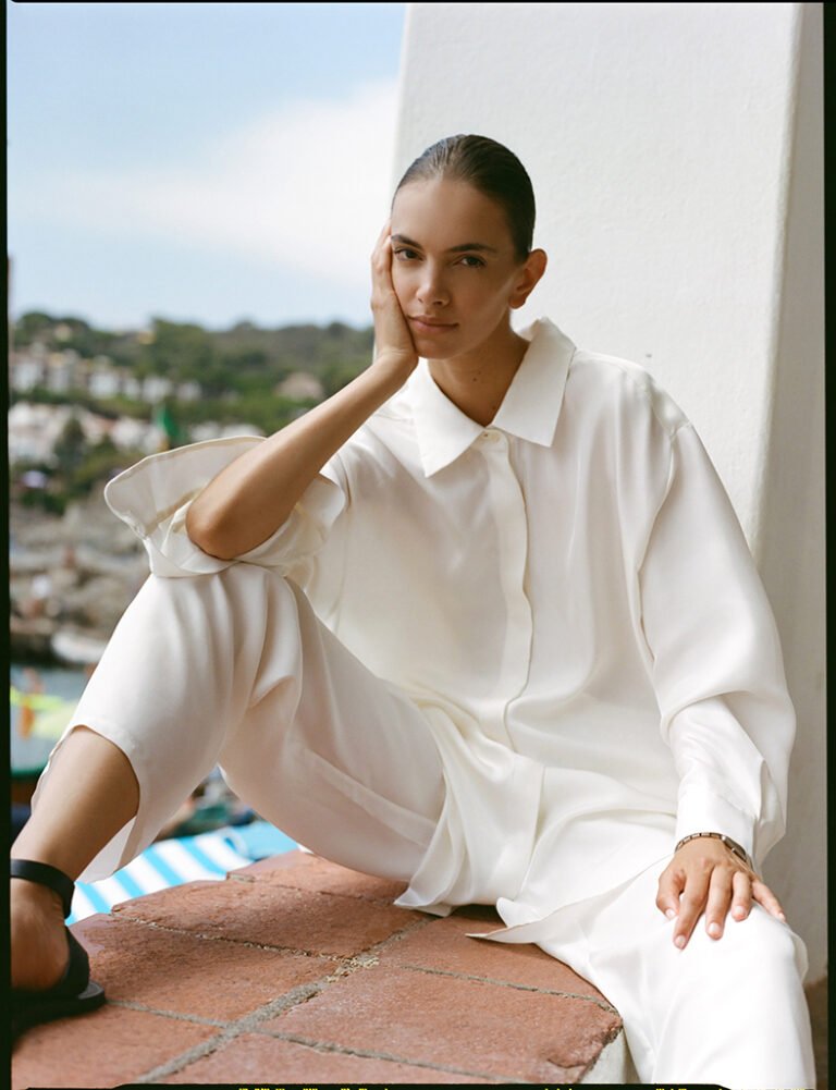 Portrait of a model in white outfit