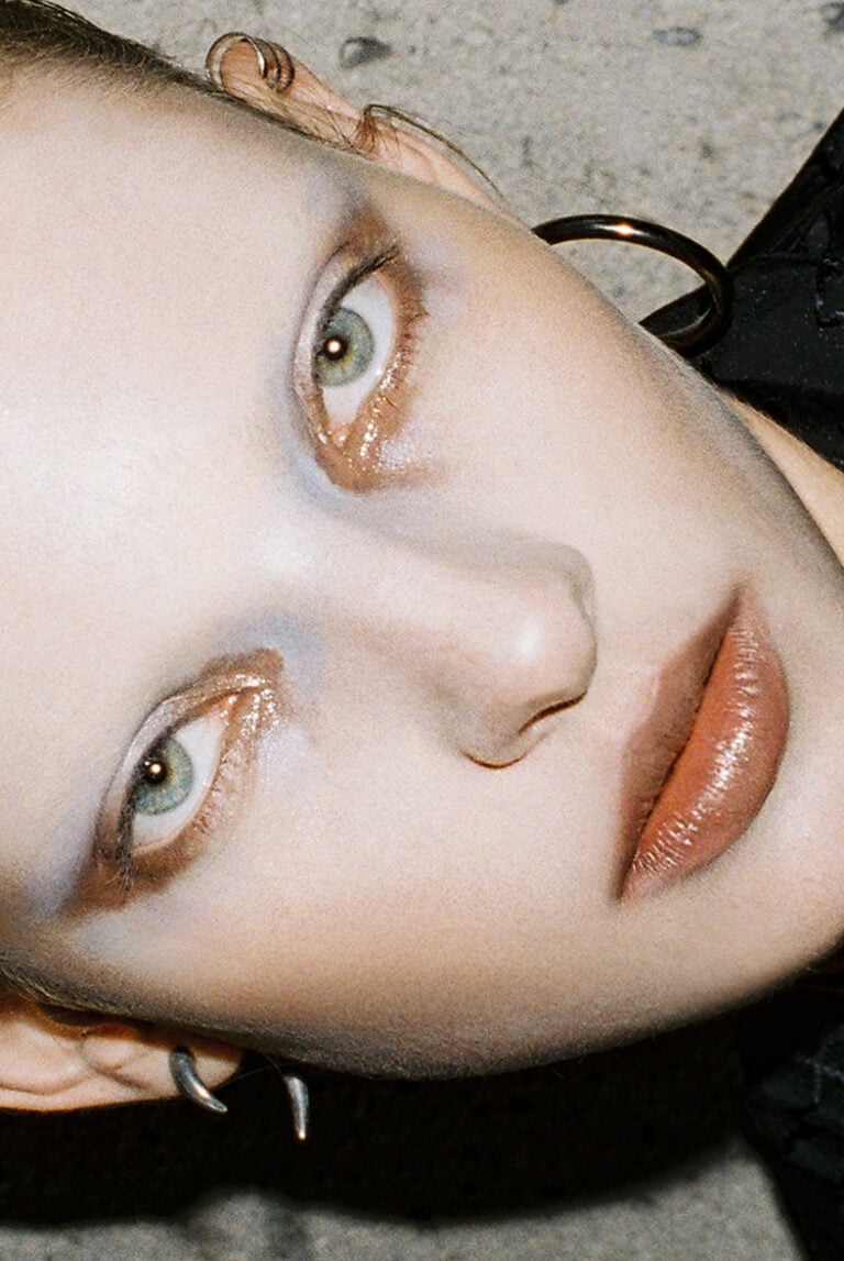 Close-up photograph of model's face