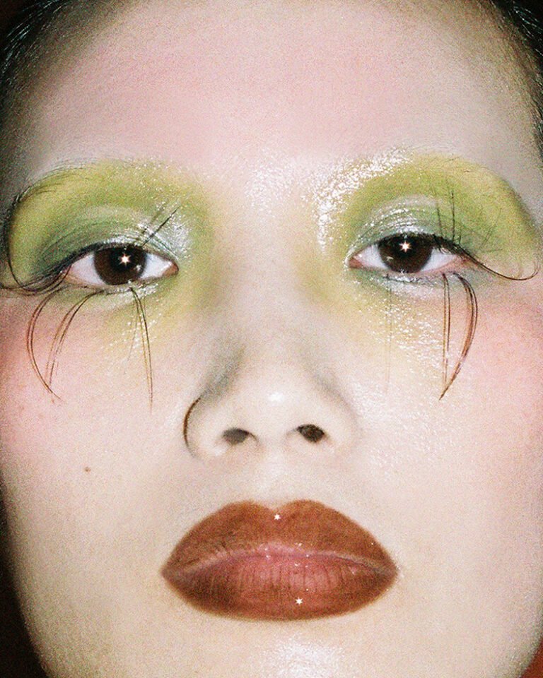 Close-up photograph of makeup model's face