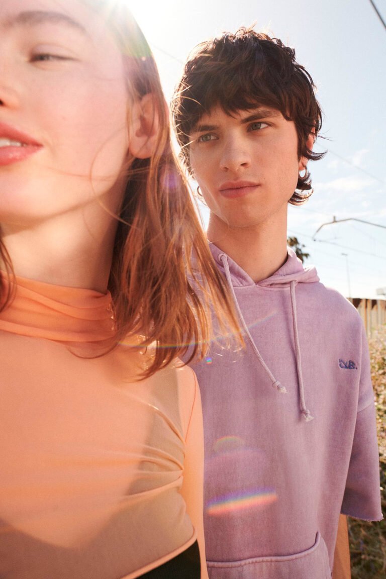 Photograph of two young male and female models