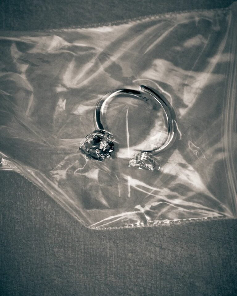 Artictic photograph of a white gold ring with two stones