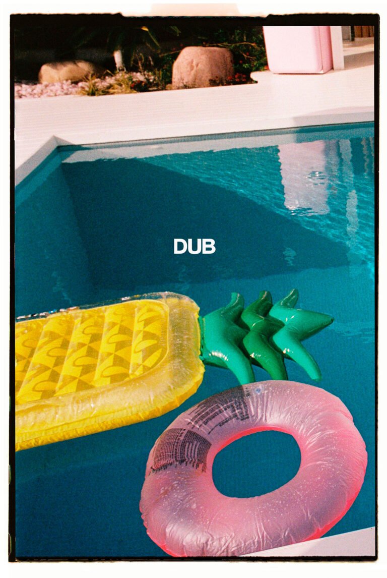 An inflatable mattress and an inflatable ring in the pool