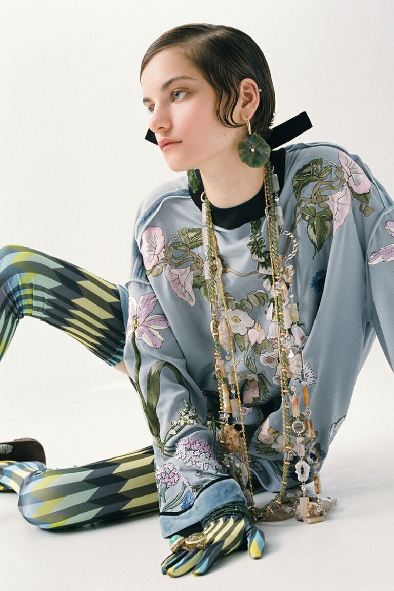 Portrait of a model with pieces of jewellery photographed on her