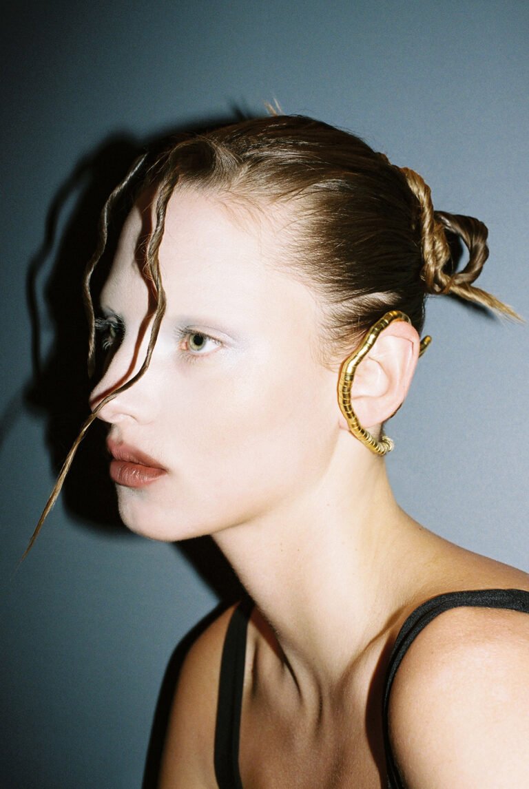 Portrait of a model with styled hair. Beauty photoshoot.