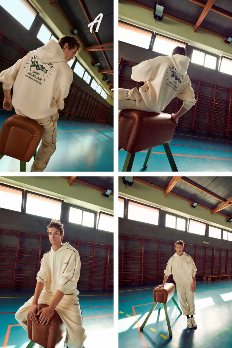 A young man wearing white sportswear in a gym