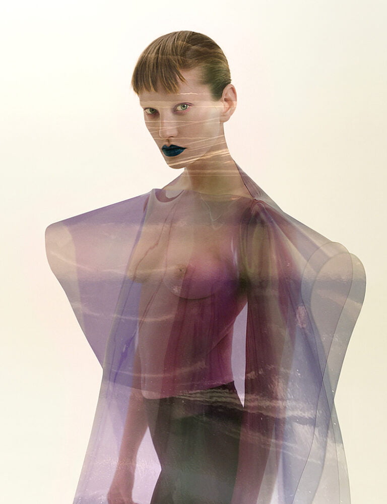 Photograph of a model in transparent outfit